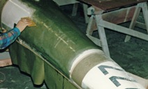 Final fiberglass layers applied to sailplane by Mansberger Aircraft